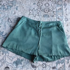 green flowy shorts
